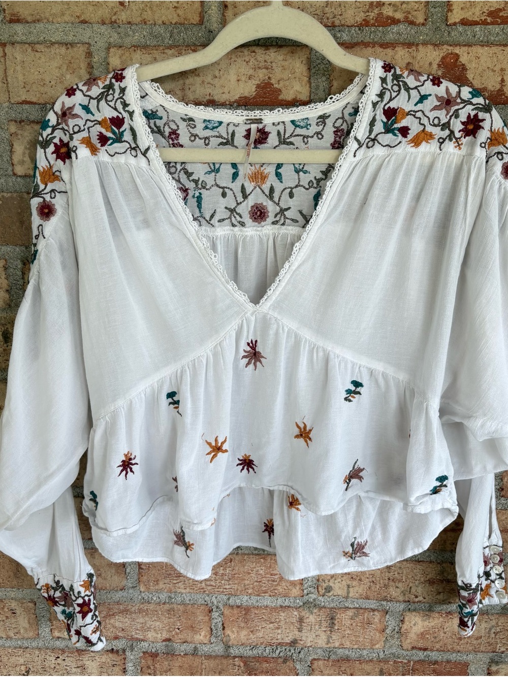 Free People Ava cropped embroidered blouse Sz small. Measurements in photos.